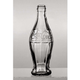 Imagen para el artículo titulado Cómo han cambiado las botellas de Coca Coca en sus 132 años de vida